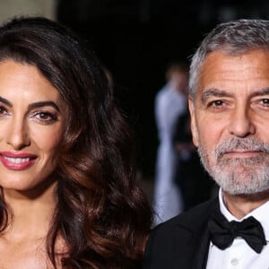 Amal Alamuddin Clooney, George Clooney au photocall du "2nd Annual Academy Museum Gala" à Los Angeles, le 15 octobre 2022. 