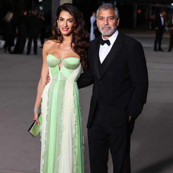 Amal Alamuddin Clooney, George Clooney au photocall du "2nd Annual Academy Museum Gala" à Los Angeles, le 15 octobre 2022. 