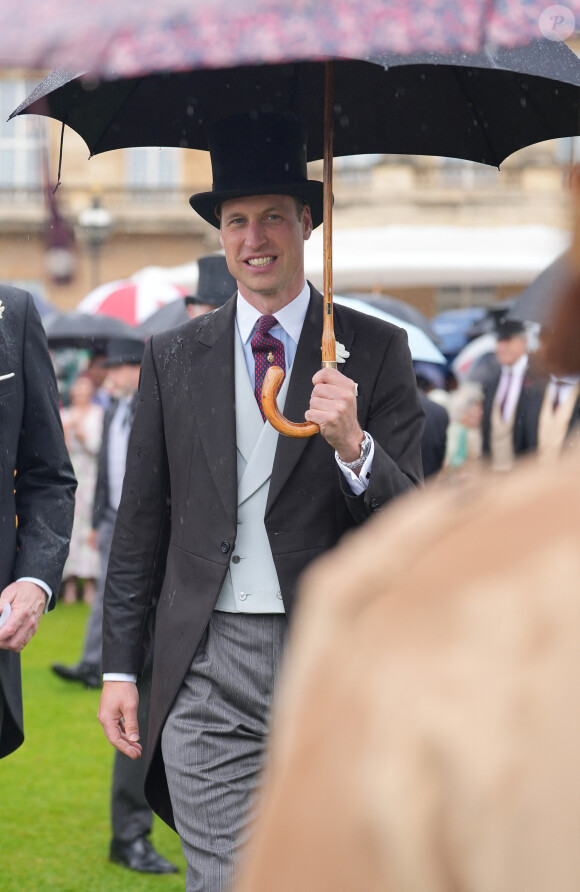 Le prince William, prince de Galles, et les invités lors de la "Garden Party du Souverain" au palais de Buckingham à Londres, le 21 mai 2024. 