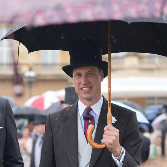 Le prince William, prince de Galles, et les invités lors de la "Garden Party du Souverain" au palais de Buckingham à Londres, le 21 mai 2024. 