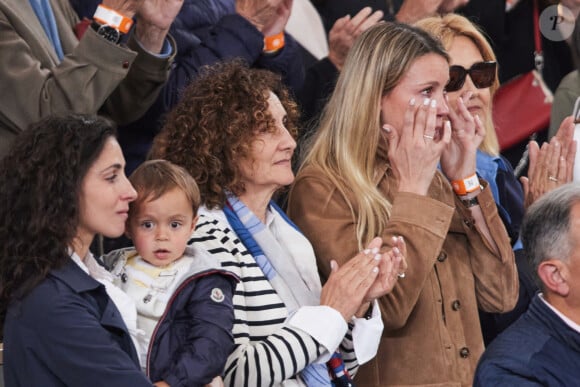 Xisca Perello (femme de Rafael Nadal), son fils Rafael Junior, Maria Isabel Nadal (soeur de Rafael Nadal) et Ana Maria Parera (mère de Rafael Nadal) - La famille de Rafael Nadal (Rafa) dans les tribunes pour le premier tour des Internationaux de France de tennis de Roland Garros 2024 opposant Rafael Nadal (Rafa) à Alexander Zverev, à Paris, France, le 27 mai 2024. © Jacovides-Moreau/Bestimage  Rafael Nadal Rafa's family in the stands for the first round of the French Open tennis tournament at Roland Garros 2024 between Rafael Nadal (Rafa) and Alexander Zverev, in Paris, France, on May 27, 2024.