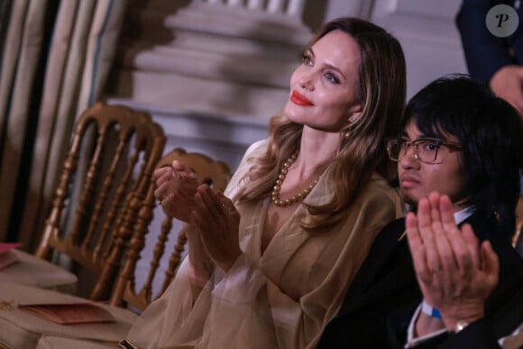 Angelina Jolie et Maddox Jolie-Pitt regardent les artistes se produire lors du dîner d'État pour le président Yoon Suk-yeol de la République de Corée organisé par le président américain Joe Biden dans la salle Est de la Maison Blanche à Washington, DC, États-Unis, le 26 avril 2023. Photo par Oliver Contreras/Pool/ABACAPRESS.COM