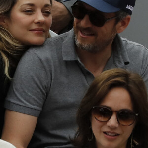 Marion Cotillard, Guillaume Canet au stade Roland-Garros, Paris, France, le 9 juin 2019. Photo par Henri Szwarc/ABACAPRESS.COM