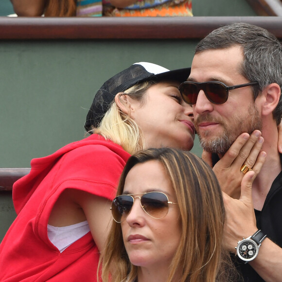 Marion Cotillard et Guillaume Canet assistent à la finale hommes de l'édition 2018 de Roland Garros - Day Fithteen à Roland Garros, le 10 juin 2018 à Paris, France. Photo par Laurent Zabulon/ABACAPRESS.COM