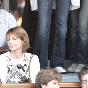 L'actrice française Mélanie Doutey et son petit ami regardent le match entre Safin et Ferrero au troisième tour des Internationaux de France au stade Roland Garros à Paris, France, le 28 mai 2005. Photo Gorassini-Zabulon/ABACA.