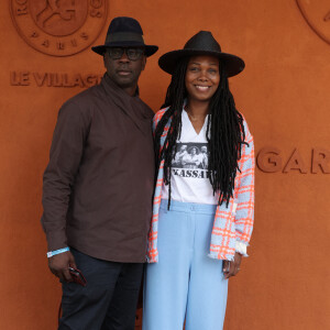 Lilian Thuram et sa femme Kareen Guiock Thuram - Célébrités dans les tribunes des Internationaux de France de tennis de Roland Garros 2024 à Paris le 8 juin 2024. © Jacovides-Moreau/Bestimage 