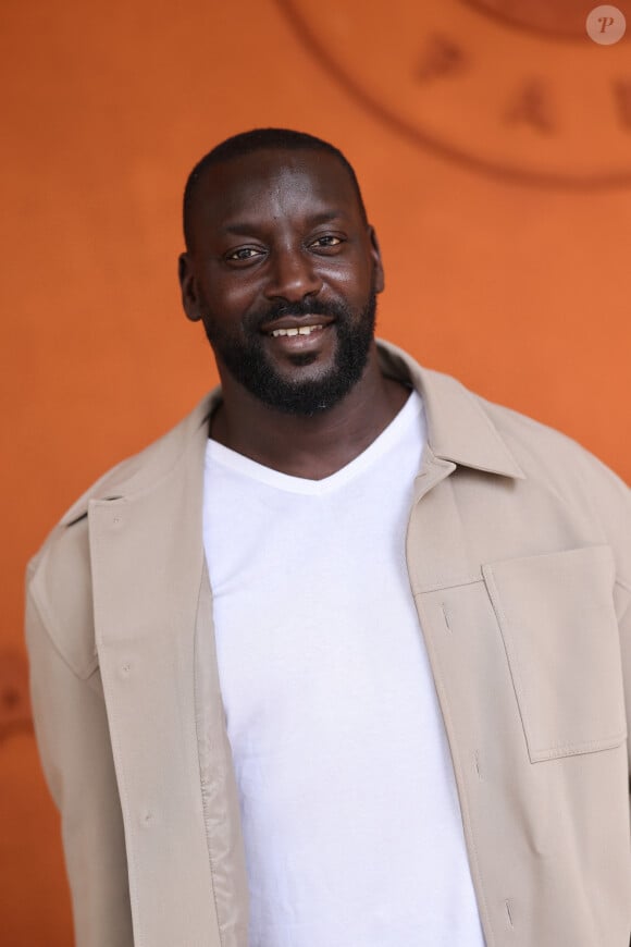 Ladji Doucouré - Célébrités dans les tribunes des Internationaux de France de tennis de Roland Garros 2024 à Paris le 8 juin 2024. © Jacovides-Moreau/Bestimage 