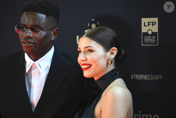 Brice Samba et Jessica Grondin lors de la 31ème édition de la cérémonie de remise des trophées de l'UNFP (Union Nationale des Footballeurs Professionnels), le 28 mai 2023 à Paris, France. Photo by Victor Joly/ABACAPRESS.COM