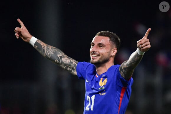 Le défenseur français Jonathan Clauss célèbre son but lors d'un match de football amical entre la France et le Luxembourg au stade Saint-Symphorien de Metz, le 5 juin 2024. Photo par Firas Abdullah/ABACAPRESS.COM