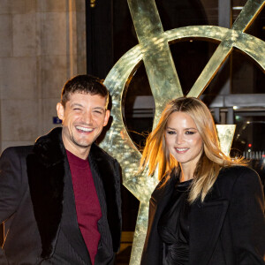 Niels Schneider et sa compagne Virginie Efira - Défilé Saint Laurent Homme Automne-Hiver 2023-2024 lors de la Fashion Week à Paris le 17 janvier 2022. © Olivier Borde/Bestimage 