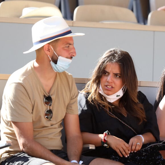 Inés Reg et guest dans les tribunes des Internationaux de France de Roland Garros à Paris le 11 juin 2021. © Dominique Jacovides / Bestimage