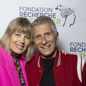 Nagui et sa femme Mélanie Page au photocall du concert du gala des 20 ans de la fondation Recherche Alzheimer "2 générations chantent pour la 3ème" à l'Olympia à Paris le 18 mars 2024. © Cyril Moreau / Bestimage 