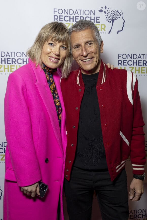 Nagui et sa femme Mélanie Page au photocall du concert du gala des 20 ans de la fondation Recherche Alzheimer "2 générations chantent pour la 3ème" à l'Olympia à Paris le 18 mars 2024. © Cyril Moreau / Bestimage 