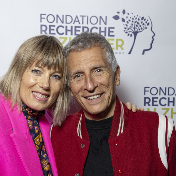 Nagui et sa femme Mélanie Page au photocall du concert du gala des 20 ans de la fondation Recherche Alzheimer "2 générations chantent pour la 3ème" à l'Olympia à Paris le 18 mars 2024. © Cyril Moreau / Bestimage 
