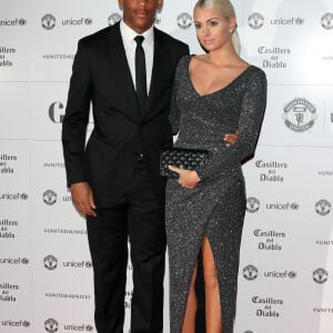 Anthony Martial et sa compagne Mélanie da Cruz sont apparus pour la première fois en public au photocall du dîner de gala "The United for UNICEF" au stade Old Trafford à Manchester, Royaume Uni, le 31 octobre 2016.