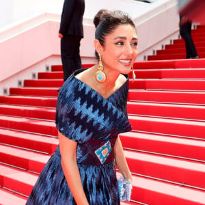 Golshifteh Farahani (Habillée par Araz Fazeli) - Montée des marches du film " The seed of the sacred fig " lors du 77ème Festival International du Film de Cannes, au Palais des Festivals à Cannes. Le 24 mai 2024 © Jacovides-Moreau / Bestimage 