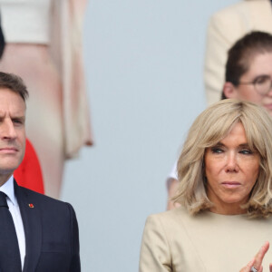 Emmanuel Macron et sa femme Brigitte en tribune présidentielle lors de la cérémonie du 144ème défilé militaire du 14 juillet, jour de la Fête Nationale, avenue Foch à Paris, France, le 14 juillet 2024. © Dominique Jacovides/Bestimage