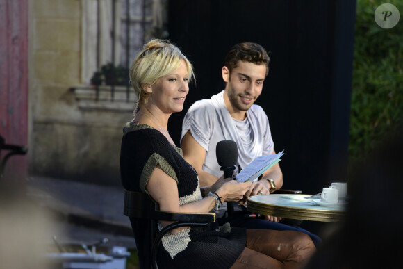 Marwan Berreni (acteur dans la serie "Plus Belle la Vie") - Rebecca Hampton sur un plateau lors de la Foire Internationale de Marseille, le 30 septembre 2013.