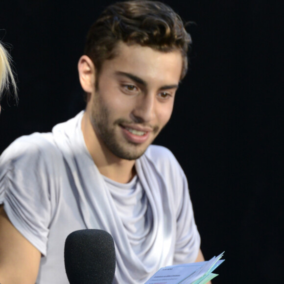 Marwan Berreni (acteur dans la serie "Plus Belle la Vie") - Rebecca Hampton sur un plateau lors de la Foire Internationale de Marseille, le 30 septembre 2013.