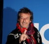 "Je ne veux pas parce que je me sens encore comme un petit artisan", avait alors justifié Jean-Luc Reichmann, ferme sur ses positions. 
Jean-Luc Reichmann - Photocall du vernissage de l'exposition "Johnny Hallyday, l'exposition" au Palais des Expositions à Paris. Le 21 décembre 2023 © Dominique Jacovides / Bestimage