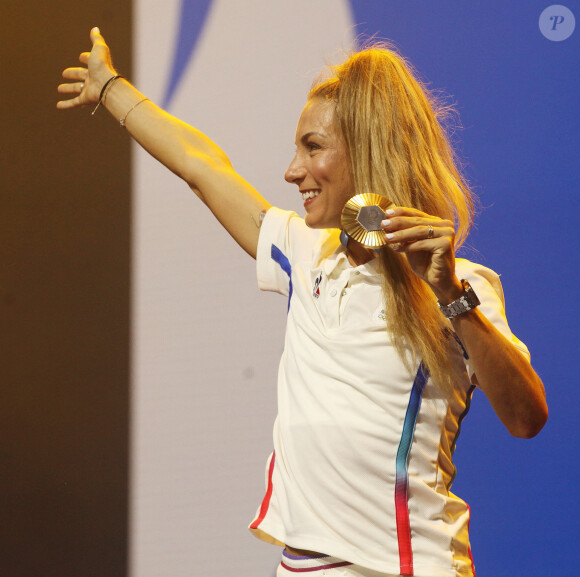 Pauline Ferrand-Prévot, médaille d'or en VTT, au Club France lors des Jeux Olympiques Paris 2024. Le 28 juillet 2024 © Jonathan Rebboah / Panoramic / Bestimage