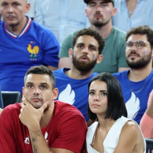 Florent Manaudou et sa compagne Lola Duménil - Les célébrités assistent à la victoire de l'équipe de France de basket face au Canada (82-73) lors des Jeux Olympiques de Paris2024, le 6 août 2024. © Jacovides-Perusseau / Bestimage