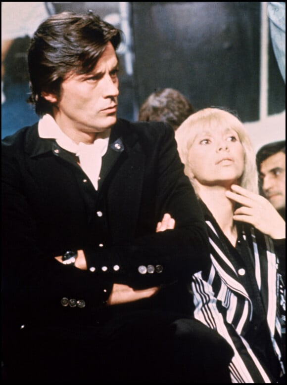 Une réponse qui fera mouche et qui déstabilisera profondément Alain Delon. Surpris, il répond aux exigences de Mireille Darc et se rend à Rome.
Archives - Alain Delon et Mireille Darc