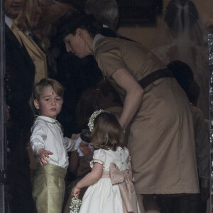 Le prince George de Cambridge, sa soeur la princesse Charlotte de Cambridge et la nounou Maria Borrallo - Mariage de P. Middleton et J. Matthew, en l'église St Mark Englefield, Berkshire, Royaume Uni, le 20 mai 2017.