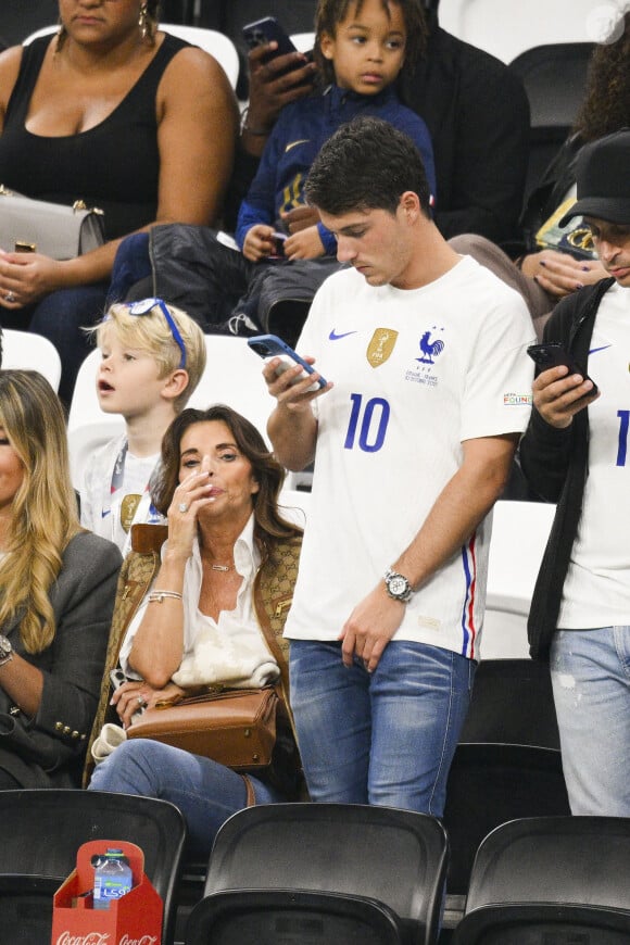 Claude Deschamps - femme de Didier Deschamps entraineur / Selectionneur France et leur Fils Dylan Deschamps - People et joueurs en famille dans les tribunes lors du match de demi-finale "France - Maroc" lors de la Coupe du Monde 2022 au Qatar (FIFA World Cup Qatar 2022). © JB Autissier / Panoramic / Bestimage