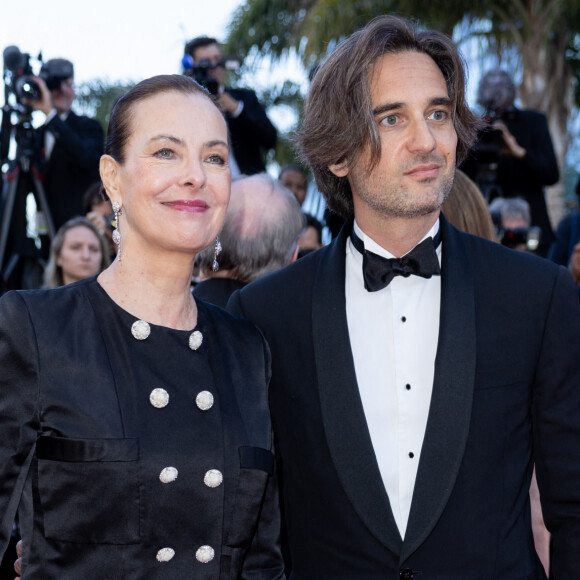 "Réassurer de son amour"
Carole Bouquet et son fils Dimitri Rassam - Montée des marches du film " Megalopolis " lors du 77ème Festival International du Film de Cannes, au Palais des Festivals à Cannes.  © Olivier Borde / Bestimage 