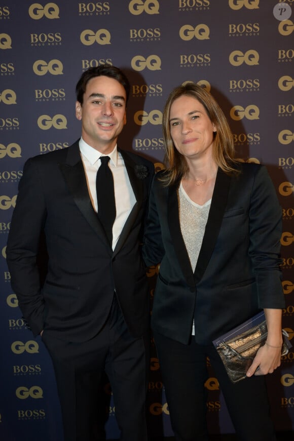 Julian Bugier et sa femme Claire Fournier lors de la soirée "L'homme de l'année GQ 2014" au Musée d'Orsay, à Paris le 19 novembre 2014.