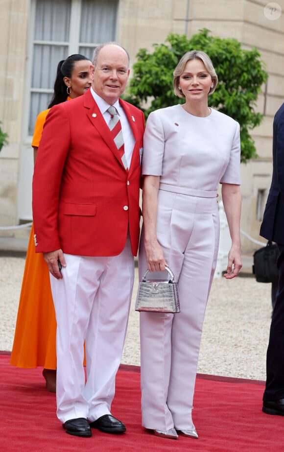 Le Prince Albert II de Monaco et la Princesse Charlène de Monaco - Emmanuel Macron, Président de la République Française, et la Première dame Brigitte Macron, accueillent les chefs d'Etat et de gouvernement présents à Paris pour la cérémonie d'ouverture des Jeux Olympiques de Paris 2024 (JO). © Dominique Jacovides - Pierre Perusseau / Bestimage