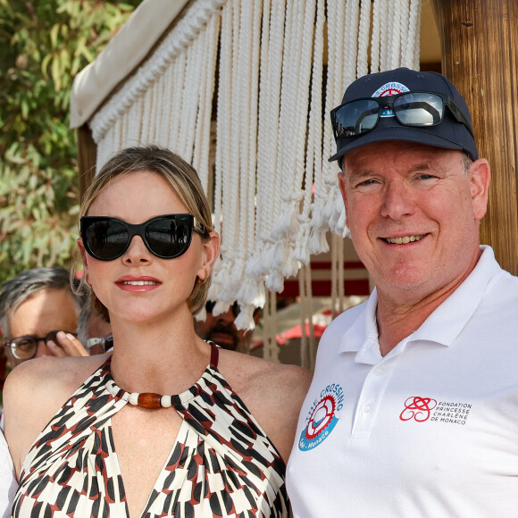 Dans la baie cannoise, ils ont assisté à la bénédiction de deux cloches destinées à la chapelle Sainte-Croix de la tour-monastère, classée monument historique
S.A.S Le prince Albert II et la princesse Charlene de Monaco lors de l'arrivée du Riviera Water Bike Challenge sur la plage du Larvotto à Monaco, le 7 septembre 2024 Une course qui relie Calvi à Monaco. © Claudia Albuquerque/Bestimage