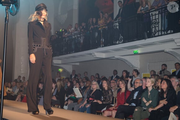 Rudy Berry (le fils adoptif de Josiane Balasko), Josiane Balasko, Laura Smet, Catherine Ringer, guests, Emmanuelle Alt - People au défilé de mode "Jean Paul Gaultier", collection Haute-Couture automne-hiver 2015/2016, au siège de la marque Jean-Paul Gaultier à Paris, le 8 juillet 2015 