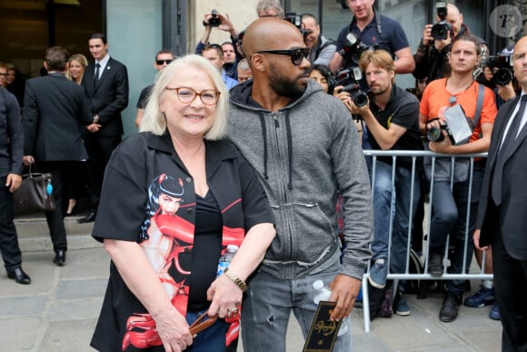 Josiane Balasko et son fils adoptif Rudy Berry - Arrivées au défilé de mode "Jean Paul Gaultier", collection Haute-Couture automne-hiver 2015/2016, au siège de la marque Jean-Paul Gaultier à Paris, le 8 juillet 2015 