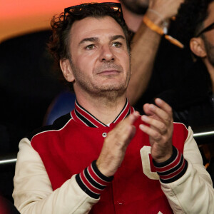 Michaël Youn - People dans les tribunes du match de Ligue des champions entre le PSG et le Borussia Dortmund (2-0) au Parc des Princes à Paris. © Cyril Moreau/Bestimage