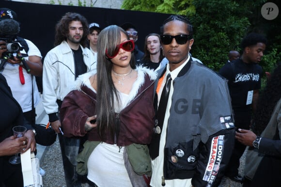 Rihanna et Asap Rocky assistent au défilé d'A$AP Rocky, " AMERICAN SABOTAGE, " Presented by AWGE Menswear Spring/Summer 2025 dans le cadre de la Semaine de la mode de Paris à Paris, France, le 21 juin 2024. Photo par Jerome Dominé/ABACAPRESS.COM