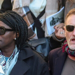 Ramatoulaye Diop, la compagne du défunt, et Jean-Paul Rouve - Sortie des Obsèques de Michel Blanc en l'église Saint-Eustache à Paris, le 10 octobre 2024. © Moreau / Jacovides / Bestimage