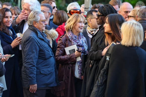 Christian Clavier, Marie-Anne Chazel, Ramatoulaye Diop, la veuve du défunt - Sortie des Obsèques de Michel Blanc en l'église Saint-Eustache à Paris, le 10 octobre 2024. © Moreau / Jacovides / Bestimage