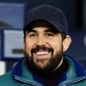 Artus - People dans les tribunes lors du match de championnat de Ligue 1 Uber Eats opposant le Paris Saint-Germain (PSG) à l'Olympique Lyonnais au Parc des Princes à Paris.