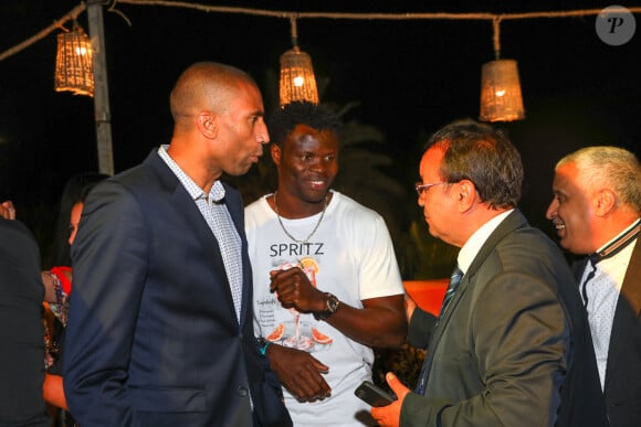 Abdeslam Ouaddou (Football), Taye Taiwo (football) au diner de gala pour le lancement de la team des Heros contre la team Morroco a l'hotel the Source Marrakech organisé par Fouad Ben Kouider, Homme d affaires président de Ben Kouider Group et sa compagne Nawel Debbouze. Marrakech, Maroc, le 7 octobre 2024. © Philippe Doignon/Bestimage