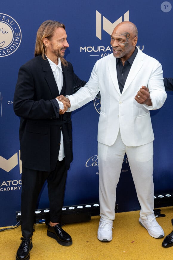 Bob Sinclar et Mike Tyson lors du 10ème anniversaire du Mouratoglou Annual Charity Gala. A la Mouratoglou Tennis Academy, Sofia Antipolis, France, le 23 juin 2024. Photo par Cyril Chateau/BACAPRESS.COM