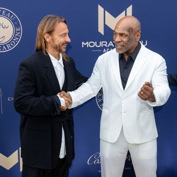 Bob Sinclar et Mike Tyson lors du 10ème anniversaire du Mouratoglou Annual Charity Gala. A la Mouratoglou Tennis Academy, Sofia Antipolis, France, le 23 juin 2024. Photo par Cyril Chateau/BACAPRESS.COM