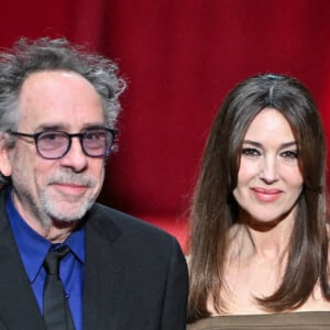 Tim Burton, Monica Bellucci lors de la cérémonie d'ouverture du 16ème Festival Lumière à Lyon, France, le 12 octobre 2024. Photo par Julien Reynaud/APS-Medias/ABACAPRESS.COM