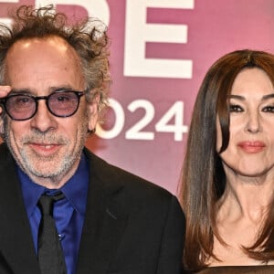 Tim Burton, Monica Bellucci lors de la cérémonie d'ouverture du 16ème Festival Lumière à Lyon, France, le 12 octobre 2024. Photo par Julien Reynaud/APS-Medias/ABACAPRESS.COM