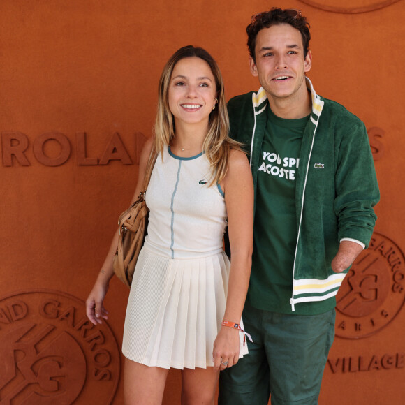 Théo Curin et sa compagne Marie-Camille Fabas - Célébrités au village lors des Internationaux de France de tennis de Roland Garros 2024 à Paris le 9 juin 2024.  Celebrities in the village during the 2024 Roland Garros French Open tennis tournament in Paris on June 9, 2024. 