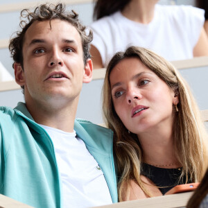 Théo Curin et sa compagne Marie-Camille Fabas - Célébrités en tribunes des Internationaux de France de tennis de Roland Garros 2023 à Paris le 11 juin 2023. © Jacovides-Moreau/Bestimage 