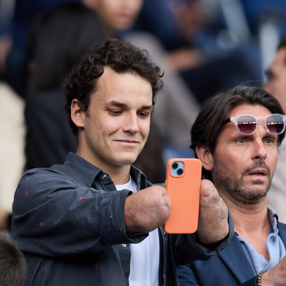 Théo Curin - People au match de football "PSG vs Lorient" au Parc des Princes à Paris. Le 30 avril 2023 © Cyril Moreau / Bestimage  