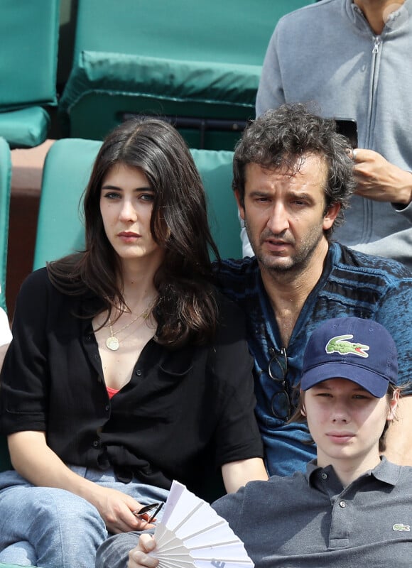 Cyrille Eldin et sa compagne Sandrine Calvayrac dans les tribunes des internationaux de Roland Garros à Paris. © Cyril Moreau - Dominique Jacovides / Bestimage