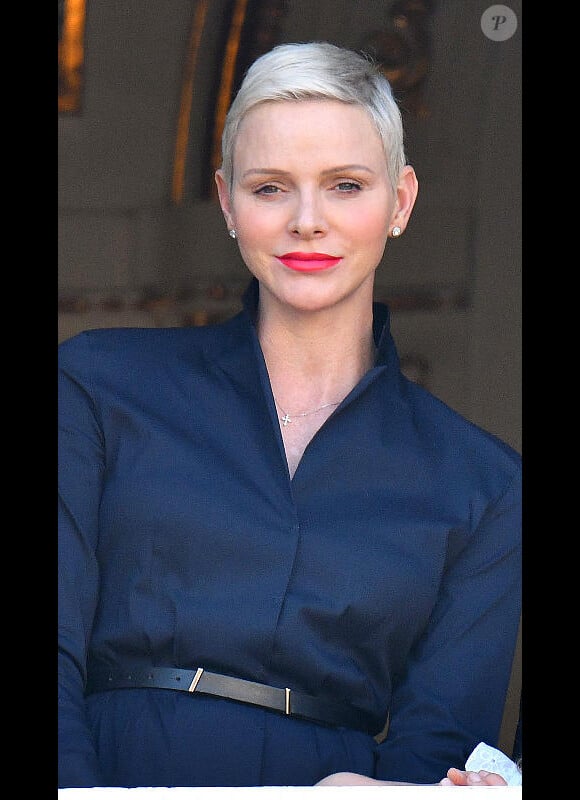 La princesse Charlene de Monaco durant la procession de la Fête Dieu sur la place du Palais, le 16 juin 2022.